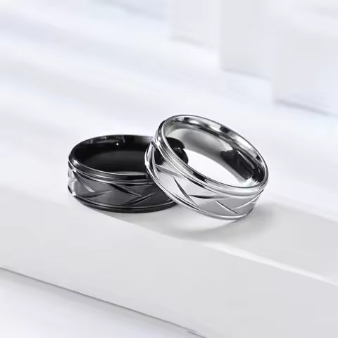 Bague Acier Inoxydable Noir Argenté - Design Rainuré Multi-facettes pour Homme et Femme
