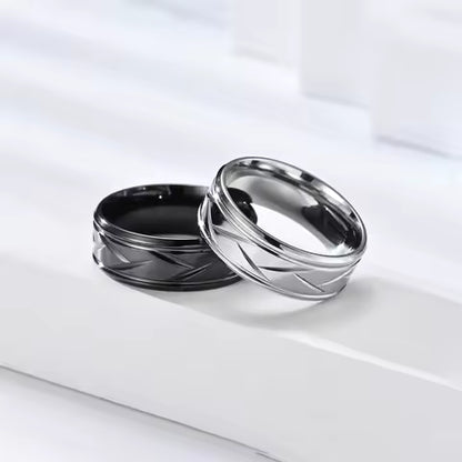 Bague Acier Inoxydable Noir Argenté - Design Rainuré Multi-facettes pour Homme et Femme