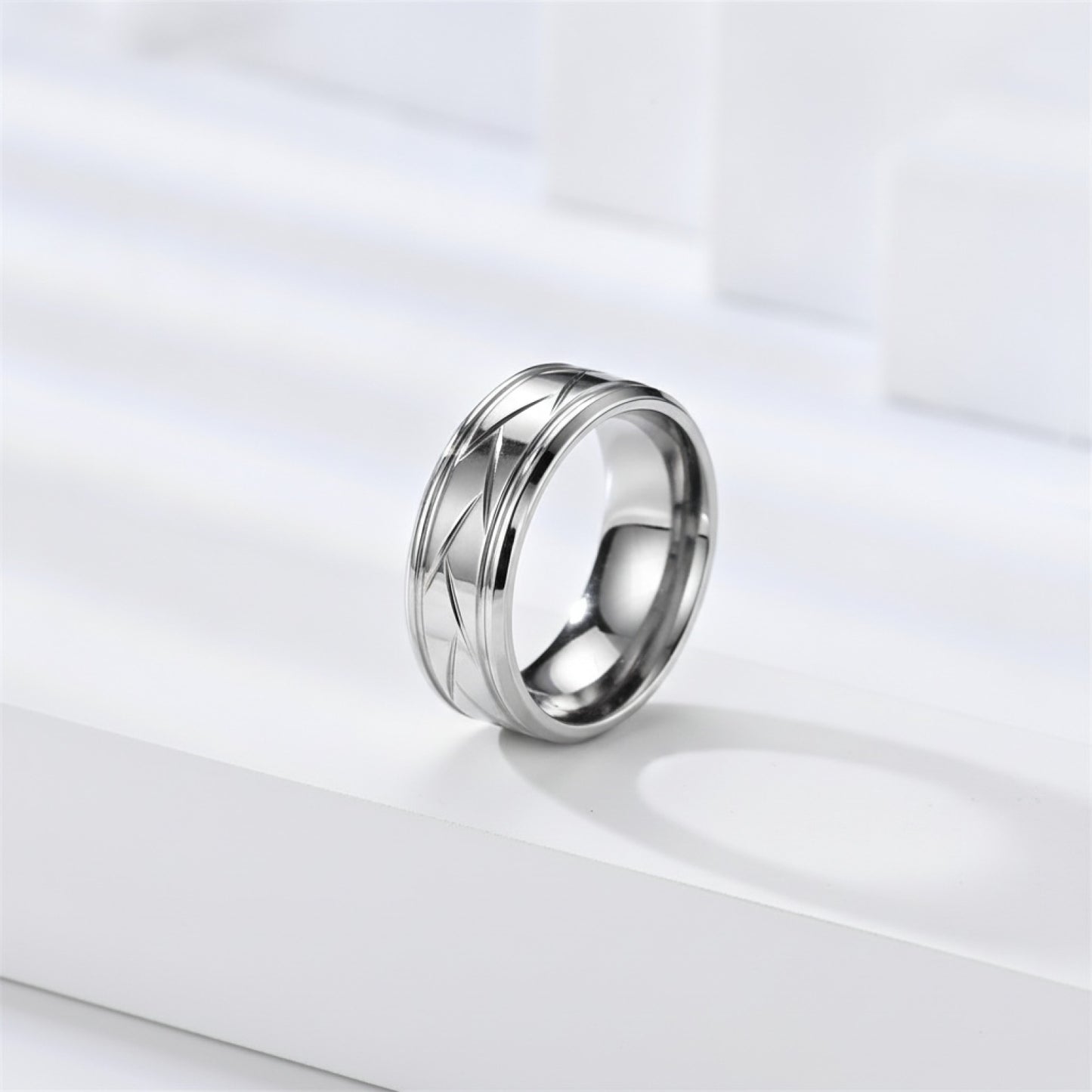 Bague Acier Inoxydable Noir Argenté - Design Rainuré Multi-facettes pour Homme et Femme
